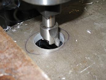  Having quickly reached the size limit of the boring head with boring bars, we start a progression of larger flycutters mounted in the boring head to enlarge the hole to the 2